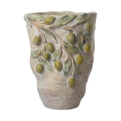 Zementvase mit Zitronen