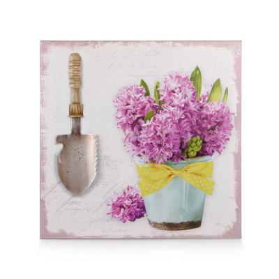 Bild Blumen im Glastopf und Blechschaufel