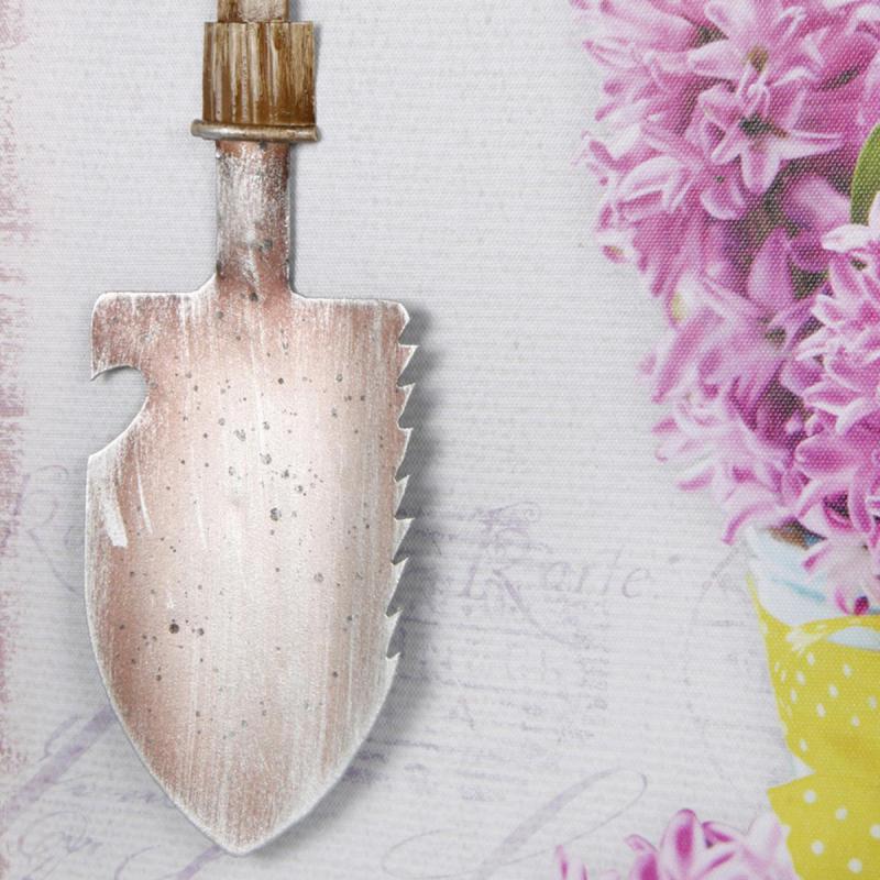 Bild Blumen im Glastopf und Blechschaufel