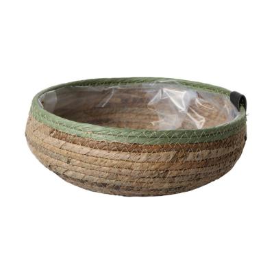 Strohkorb mit grünen Rand