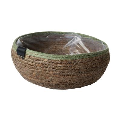 Strohkorb mit grünen Rand